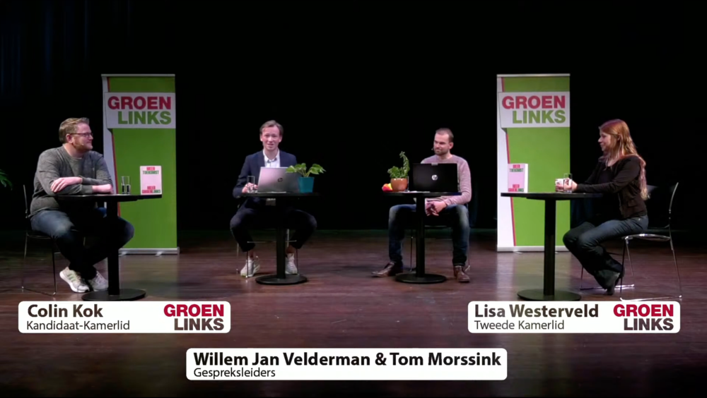 Screenshot van podium met Lisa Westerveld, Colin Kok en gespreksleiders.